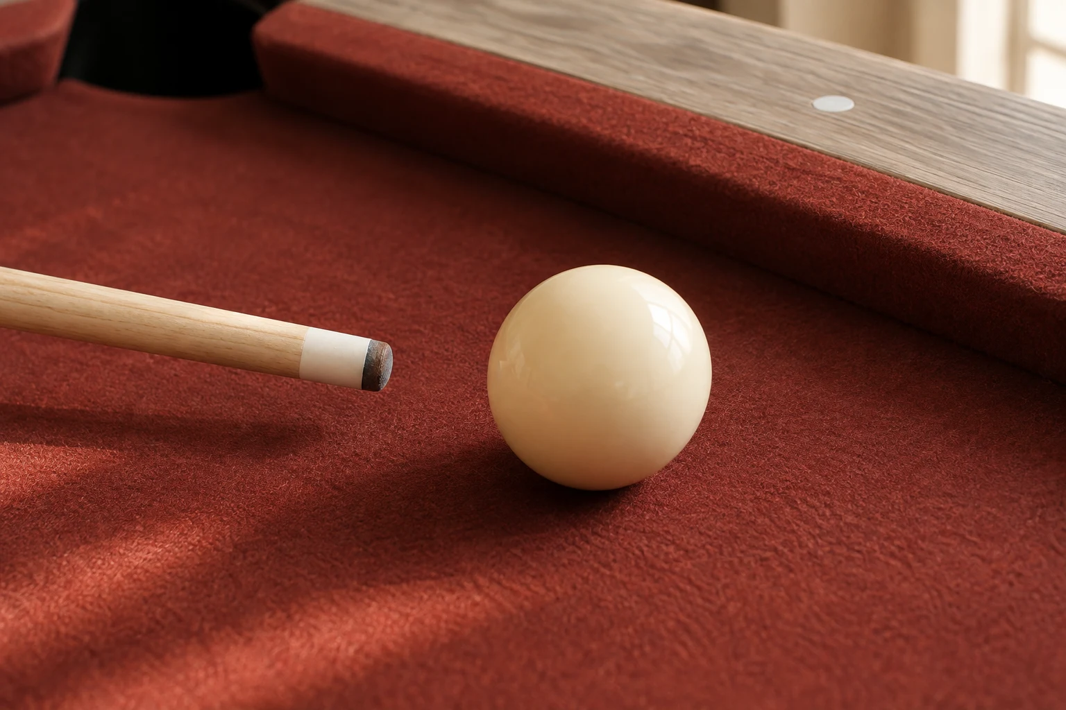 Illustrated pool cue and cue ball detail on red billiard cloth